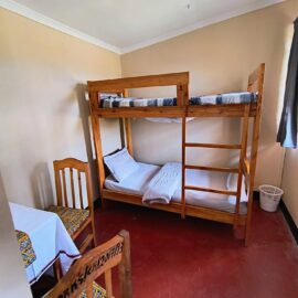 Family room with bunk beds at MARK's Farm & Lodge near Iringa